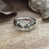 Bague vintage en argent avec fleur et colibri