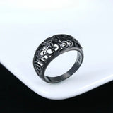 Bague vintage noire à motif floral ajouré