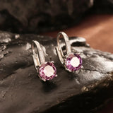 Boucles d'oreilles rondes vintage en argent violet