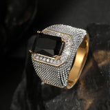Bague en or et argent avec pierre noire