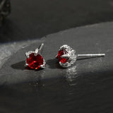 Boucles d'oreilles vintage en argent avec griffes rouges