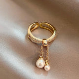 Bague vintage ajustable en or avec pompon et perles