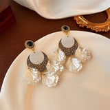 Boucles d'oreilles vintage en forme de pétales de perles