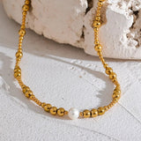 Collier avec perles et perles dorées