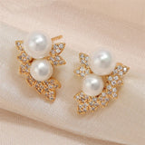 Boucles d'oreilles vintage en or avec perles et feuilles