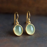 Boucles d'oreilles vintage en or avec pierre de lune verte